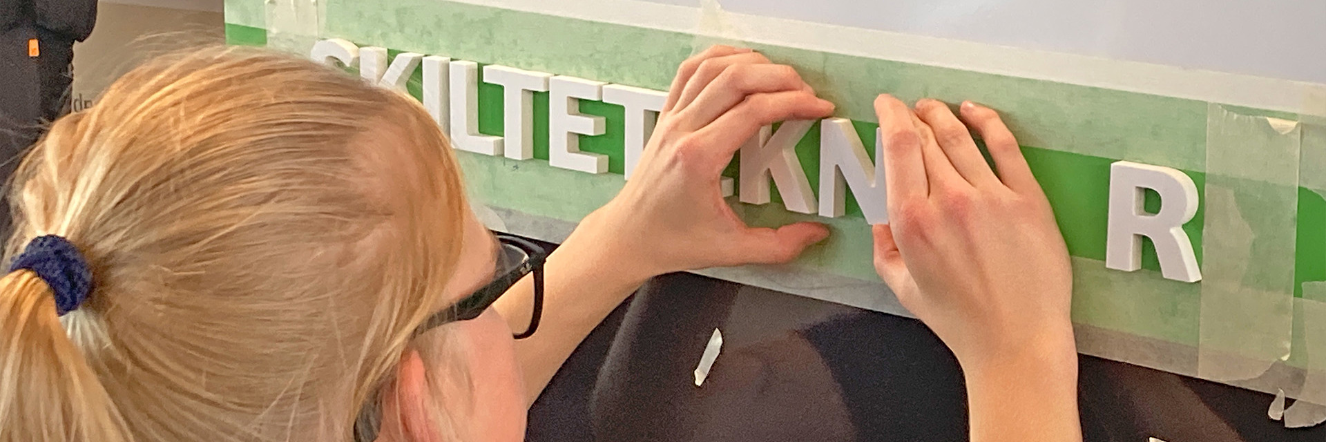 Bogstaver på skiltet